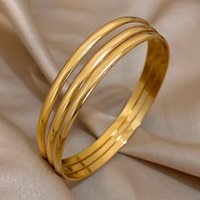 Carregar imagem no visualizador da galeria, Braceletes (03 peças) - Aço Inoxidável e Banho em Ouro 18k
