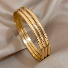 Carregar imagem no visualizador da galeria, Braceletes (03 peças) - Aço Inoxidável e Banho em Ouro 18k
