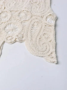 Conjunto de blusa e Saia irregular de crochê.